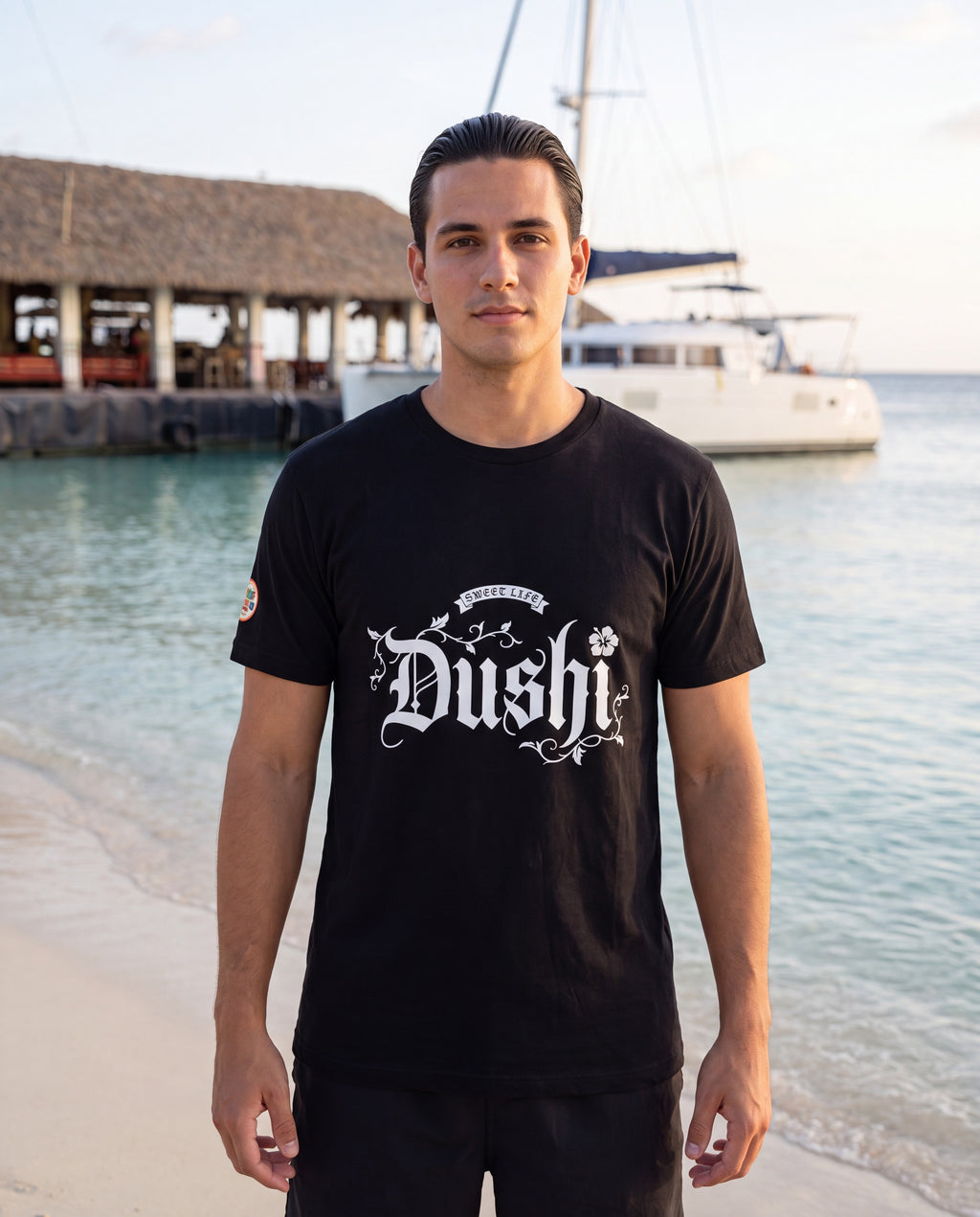 Dushi Sweet Life Blackletter Tee worn on location in Aruba