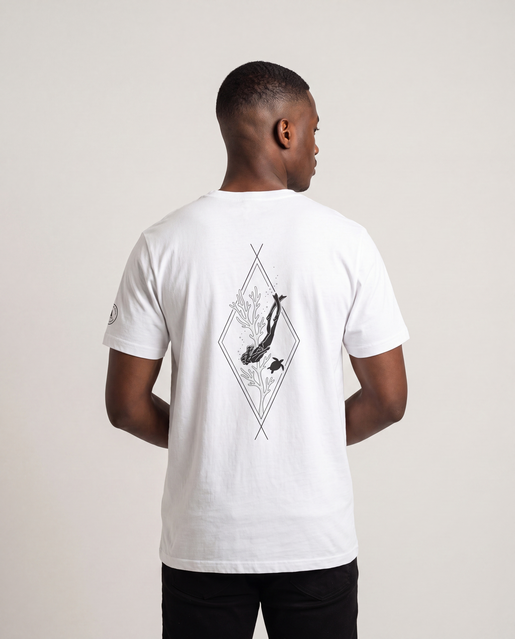 Model wearing the Aruba Freediver & Sea Turtle Tee