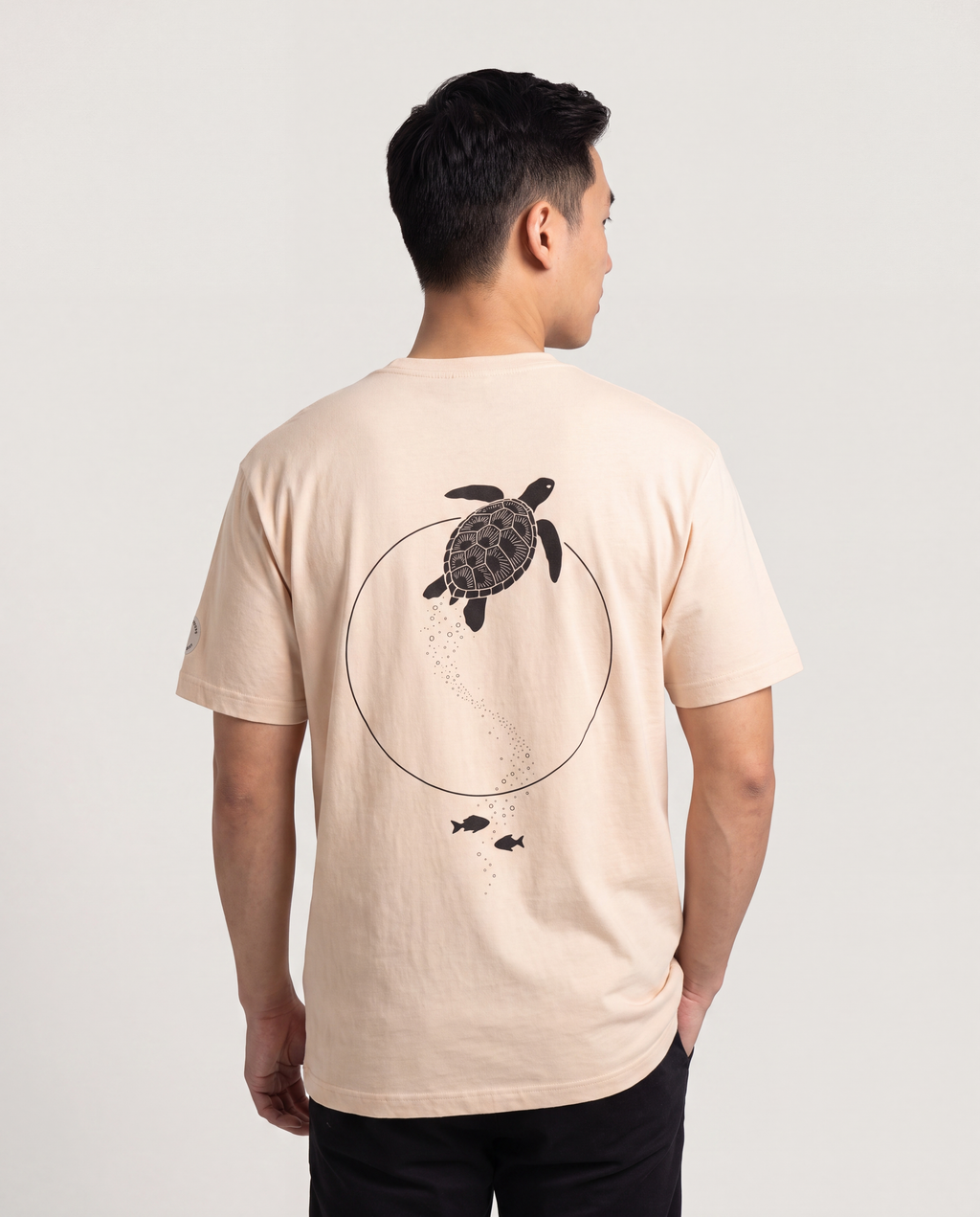 Model wearing the Aruba Sea Turtle Moon Gate Tee
