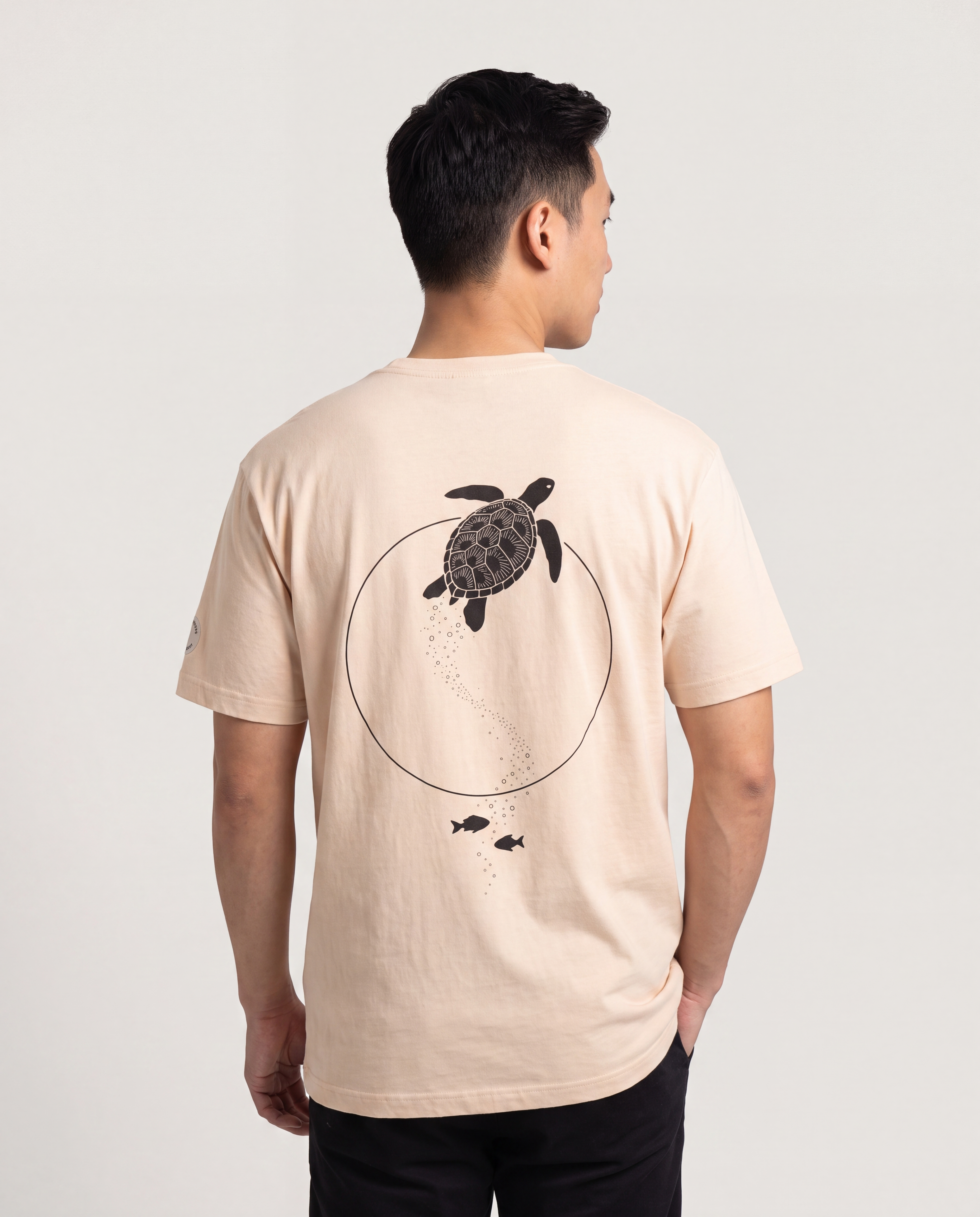 Model wearing the Aruba Sea Turtle Moon Gate Tee
