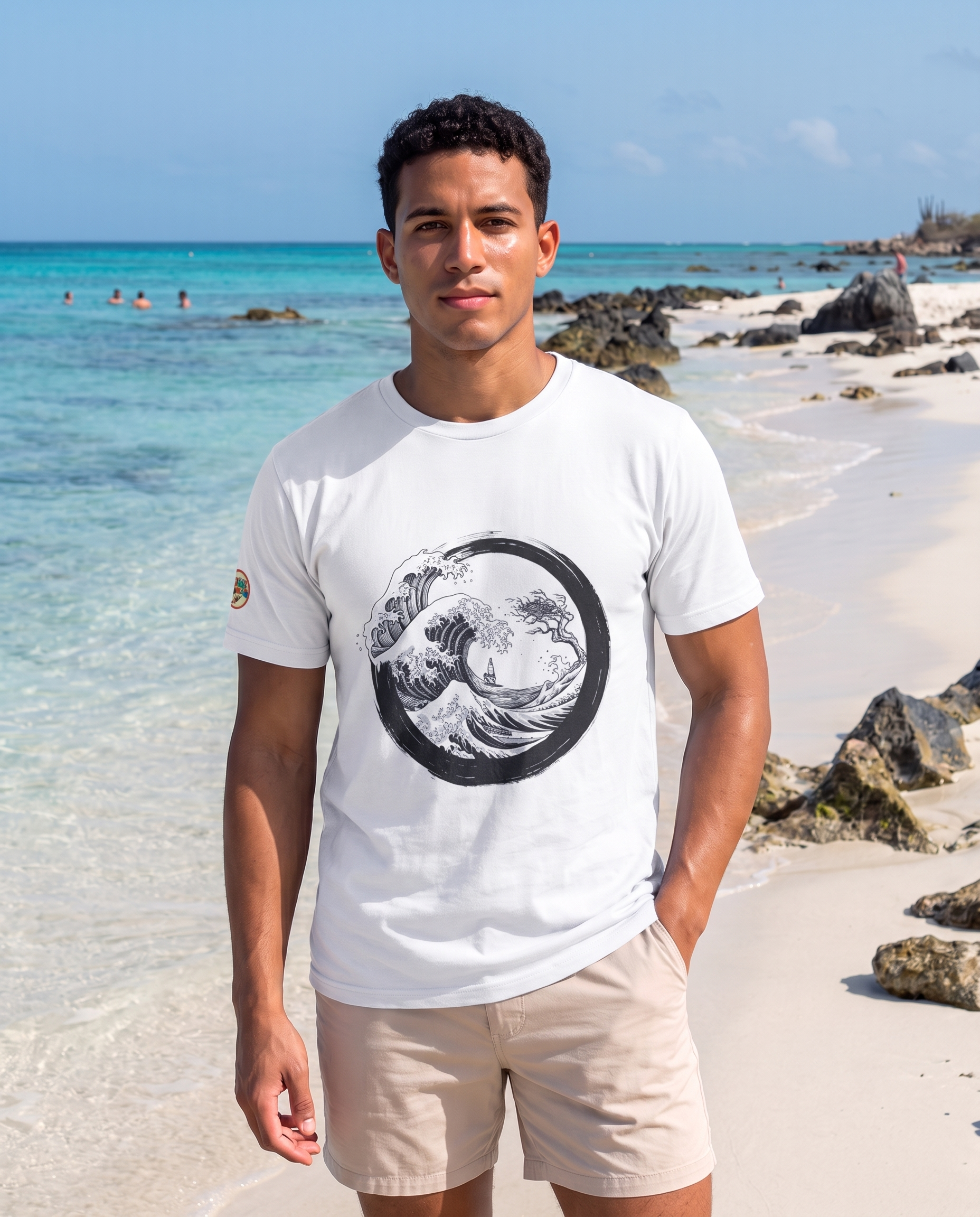 Aruba Great Wave Enso Tee in White, worn on Boca Catalina beach, Aruba