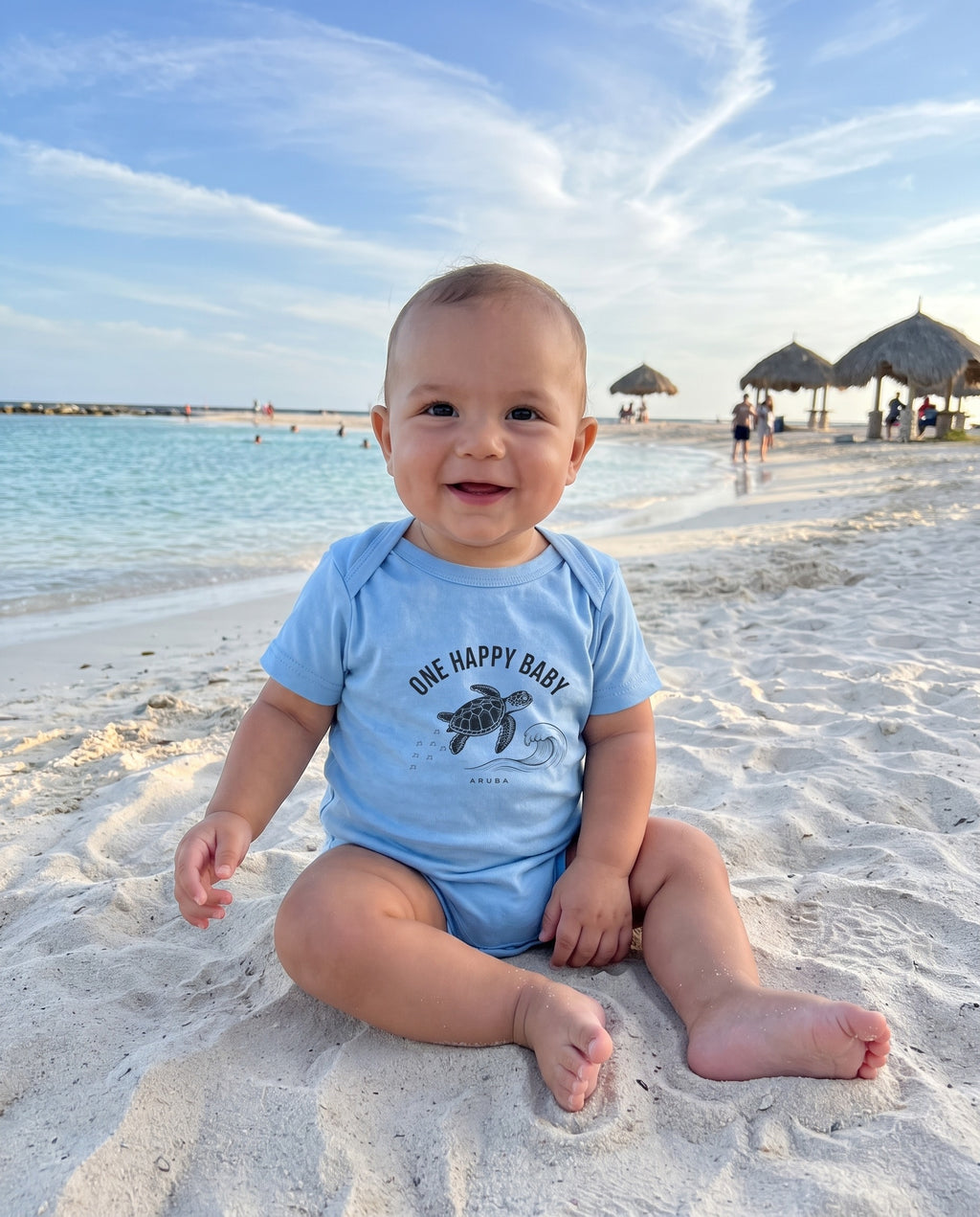 Aruba One Happy Baby Turtle Tee in Light Blue, worn on location in Aruba