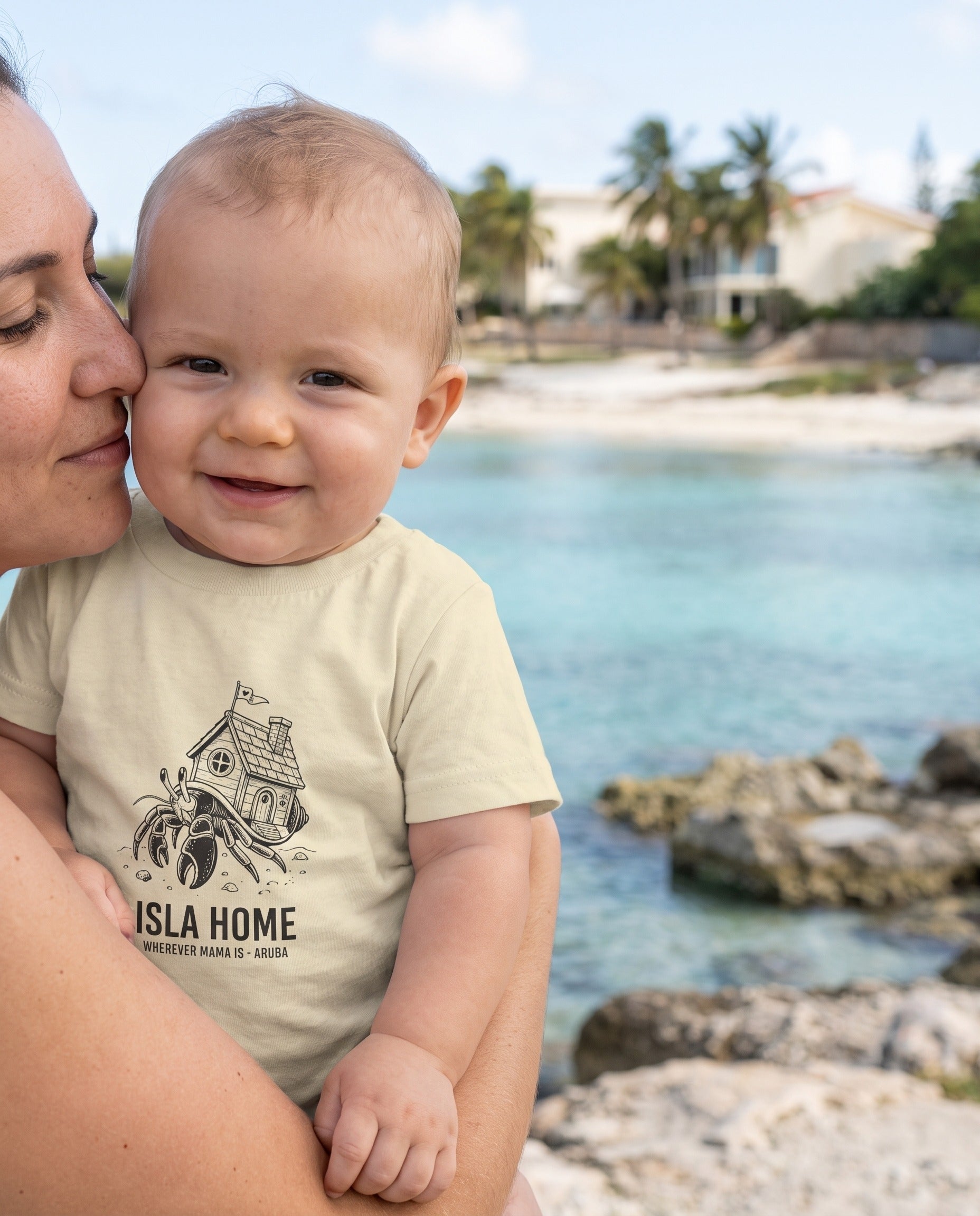 Aruba Isla Home Hermit Crab Baby Tee in Natural, worn on location in Aruba