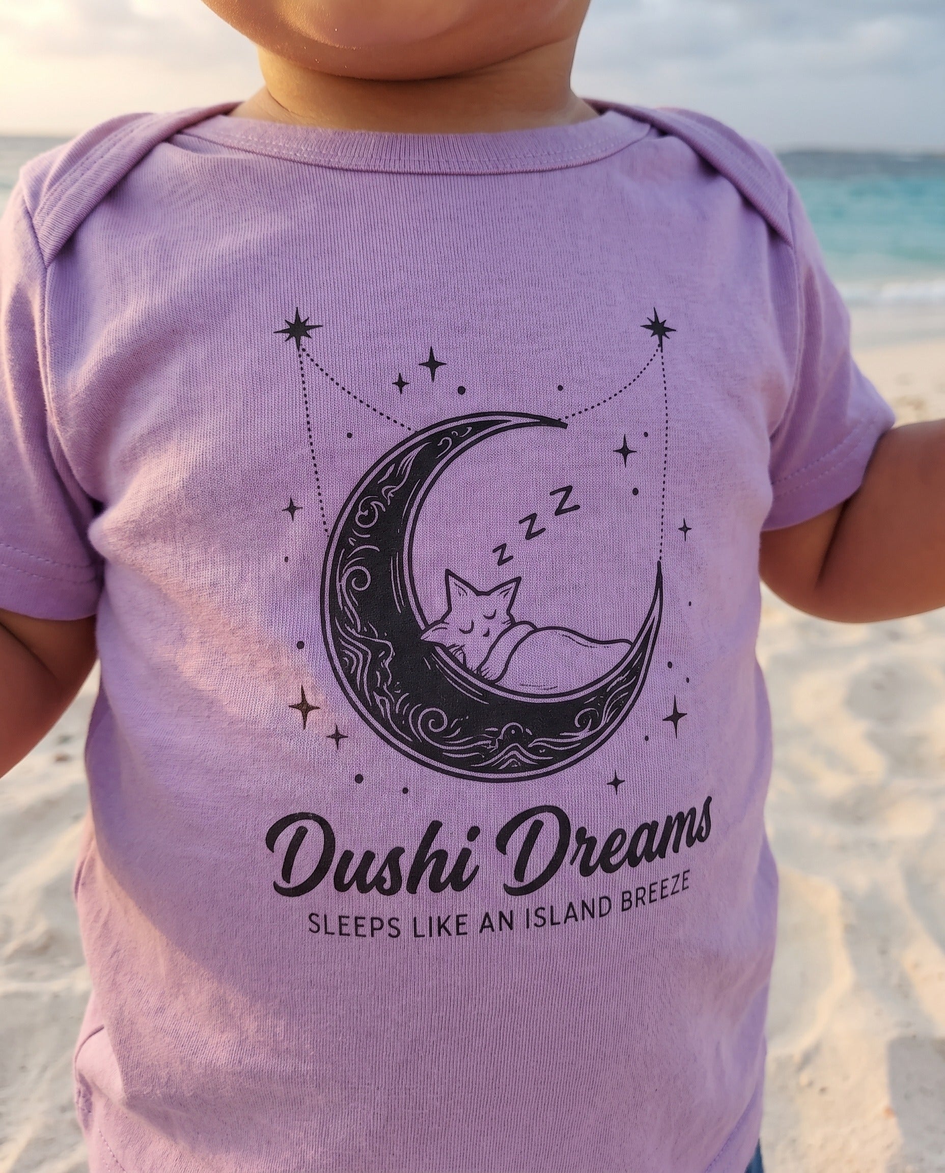 Aruba Dushi Dreams Moon Baby Tee close-up of the design, Lavender