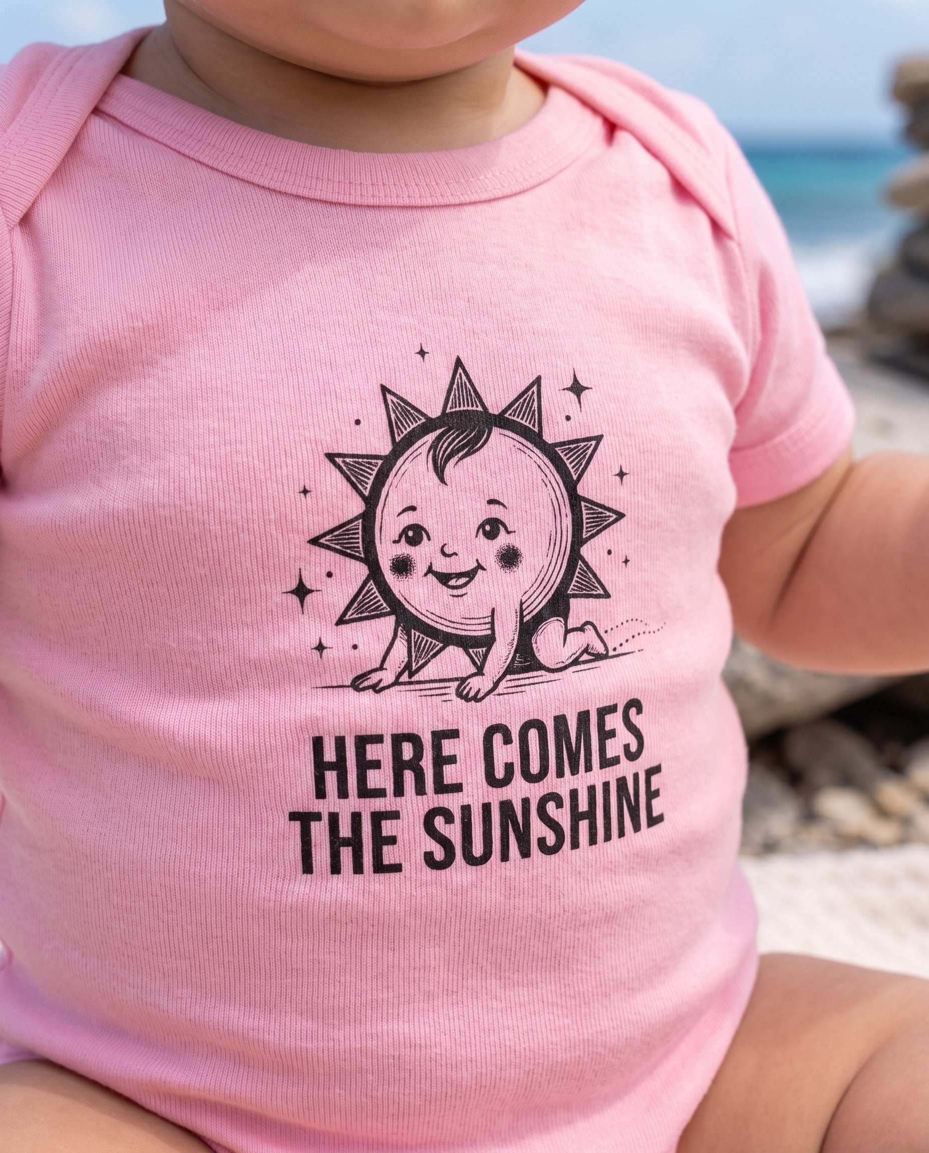 Aruba Here Comes the Sunshine Baby Bodysuit close-up of the design, Pink