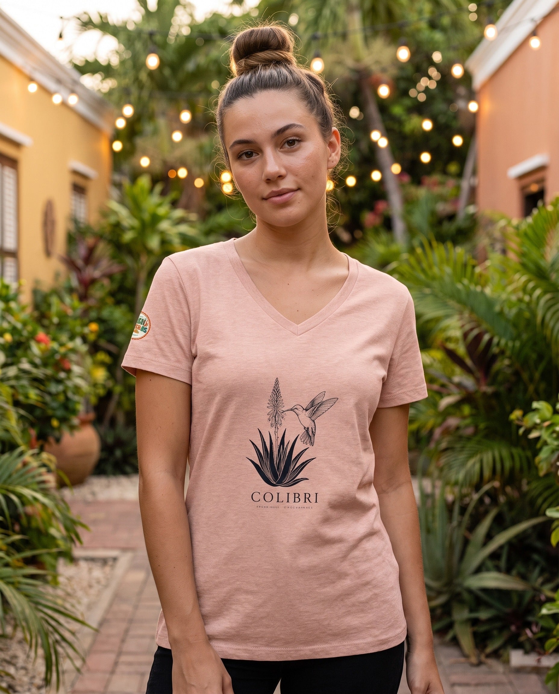 Aruba Colibri Hummingbird V-Neck Tee in Heather Peach, worn on location in Aruba