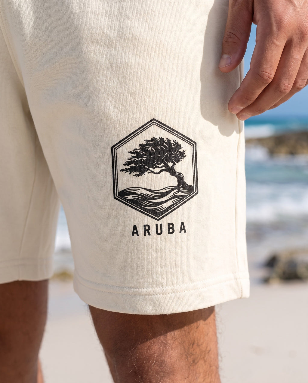 Aruba Divi Hex Badge Sweat Shorts close-up of the design, Ivory