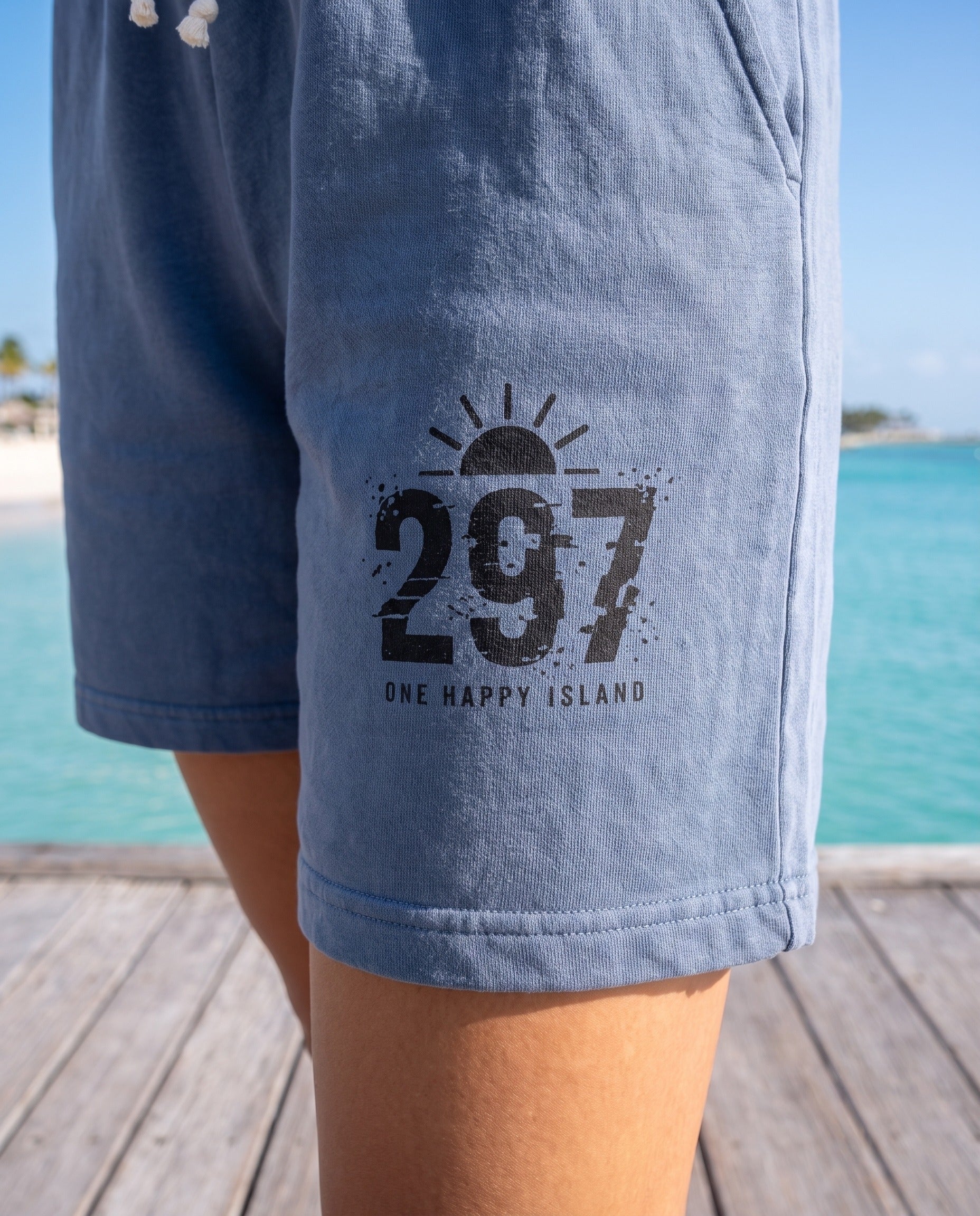 Aruba 297 One Happy Island Sweat Shorts close-up of the design, Blue Jean