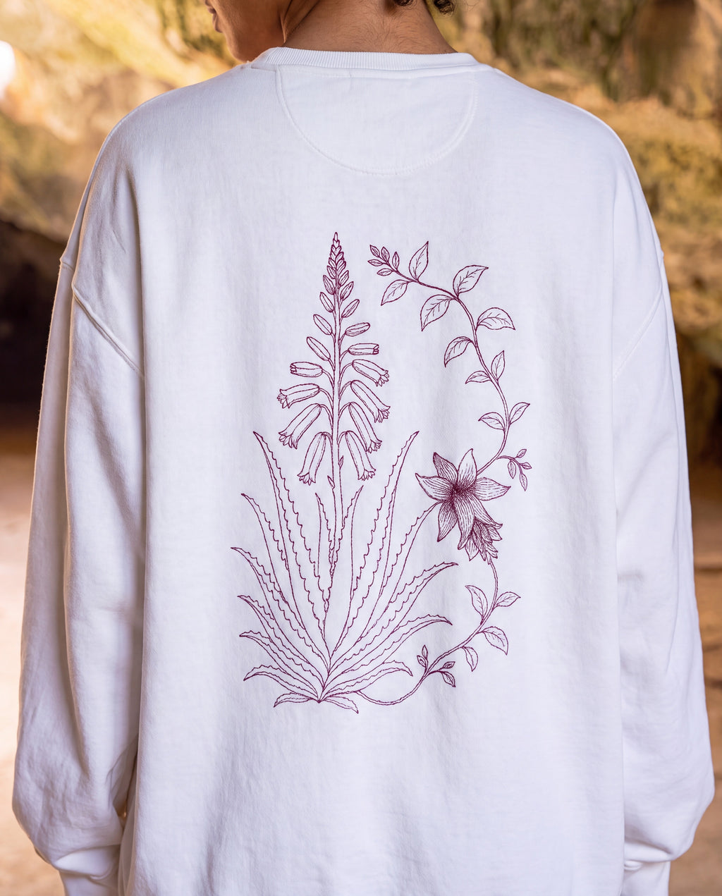 Aruba Aloe Vera Redwork Sweatshirt close-up of the design, White