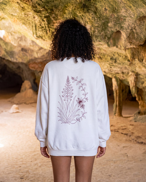 Aruba Aloe Vera Redwork Sweatshirt in White, worn on location in Aruba