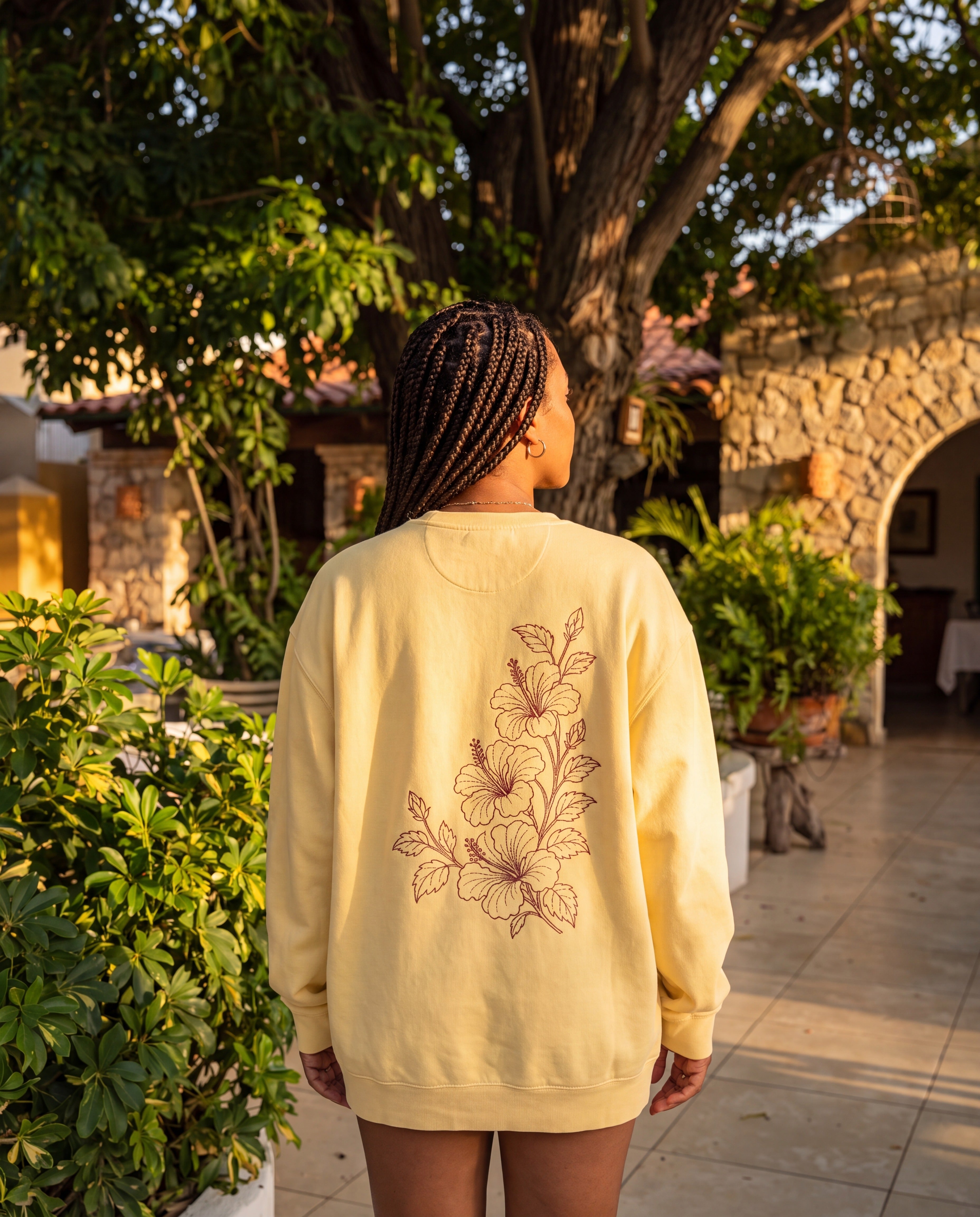 Aruba Hibiscus Spray Redwork Sweatshirt in Butter, worn on location in Aruba