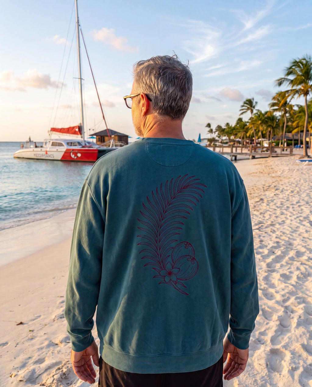 Aruba Coconut Palm Sprig Redwork Sweatshirt in Blue Spruce, worn on location in Aruba