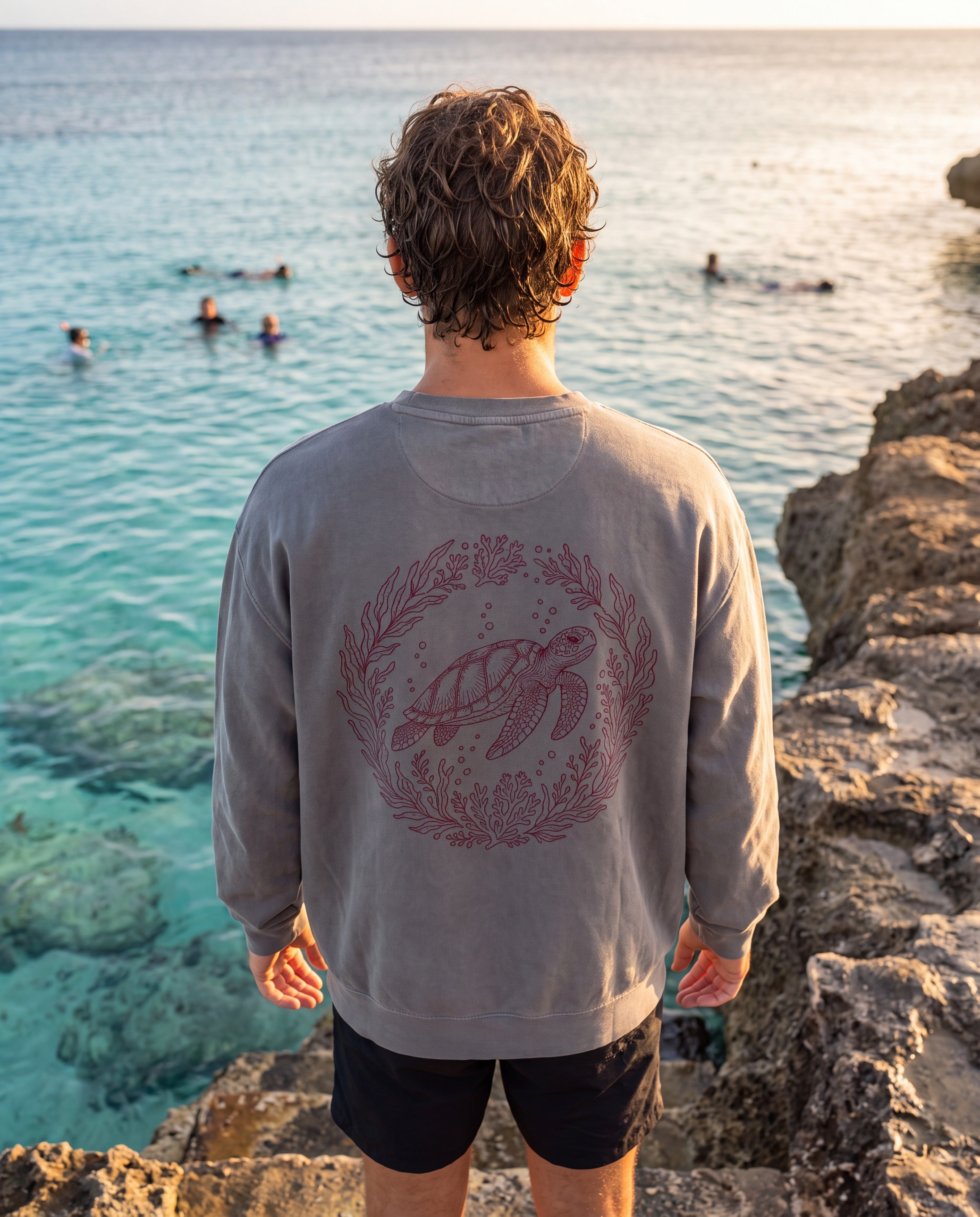 Aruba Sea Turtle Wreath Redwork Sweatshirt in Grey, worn on location in Aruba