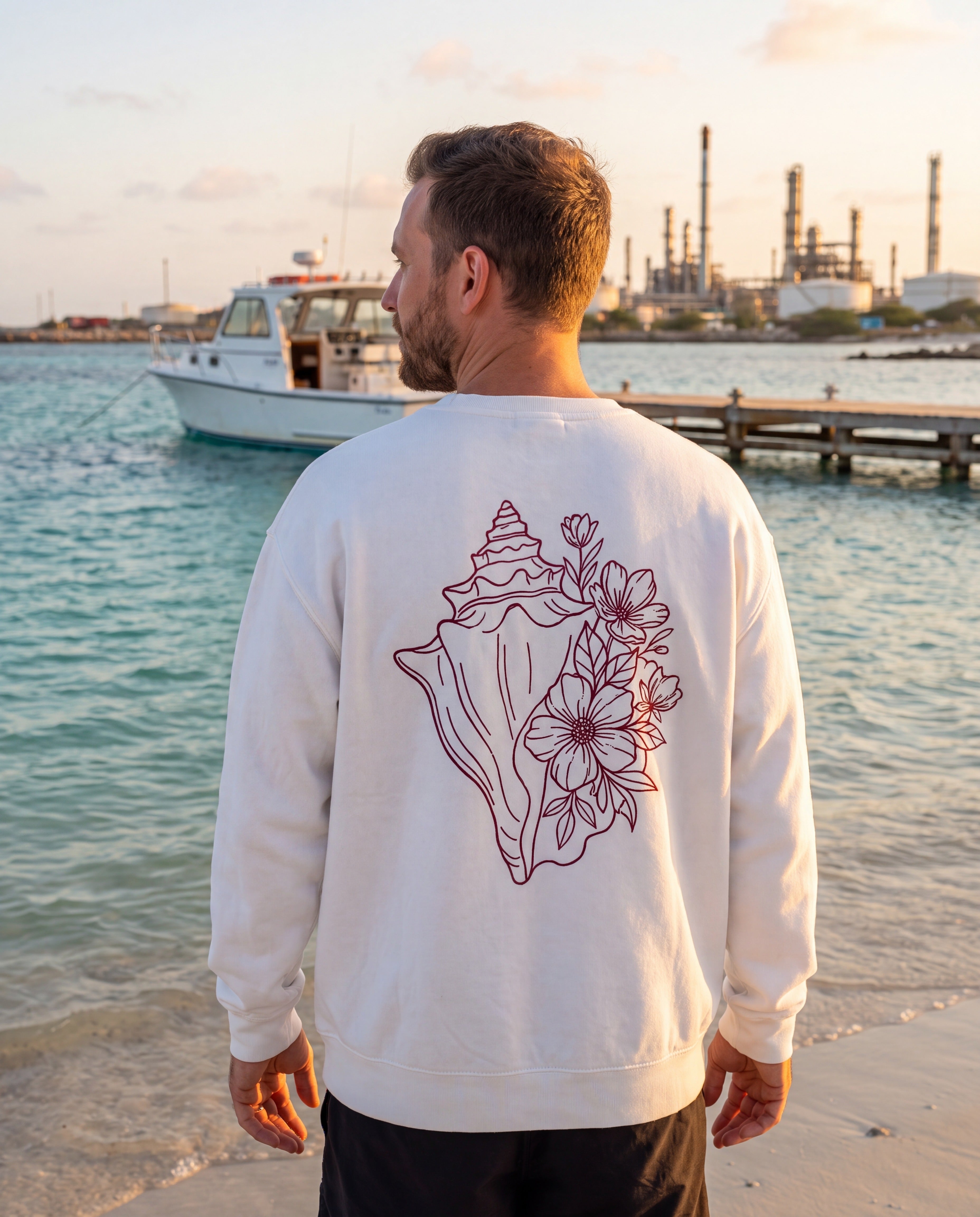 Aruba Conch Shell in Bloom Redwork Sweatshirt in White, worn on location in Aruba