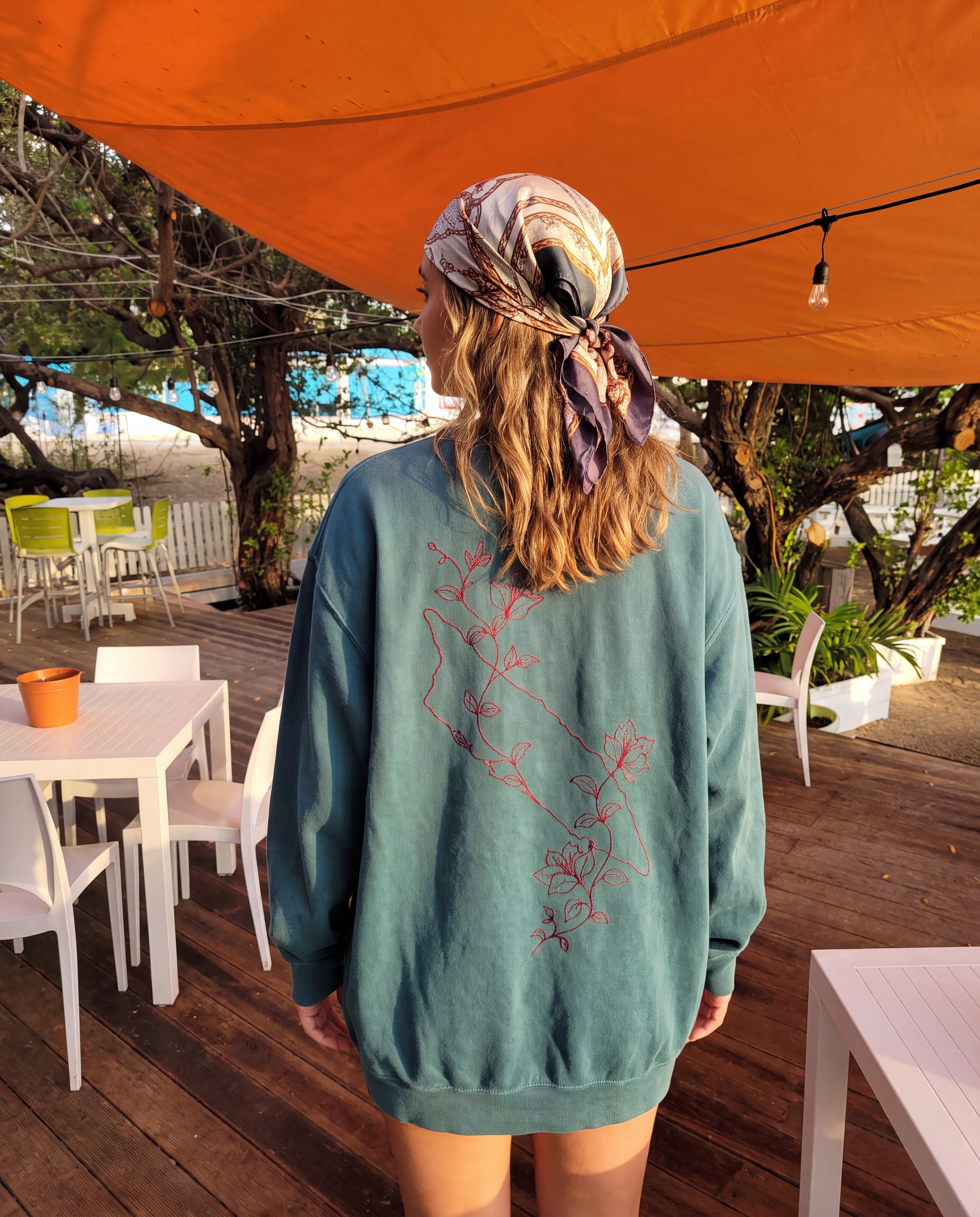 Aruba Island Vine Redwork Sweatshirt in Blue Spruce, worn on location in Aruba