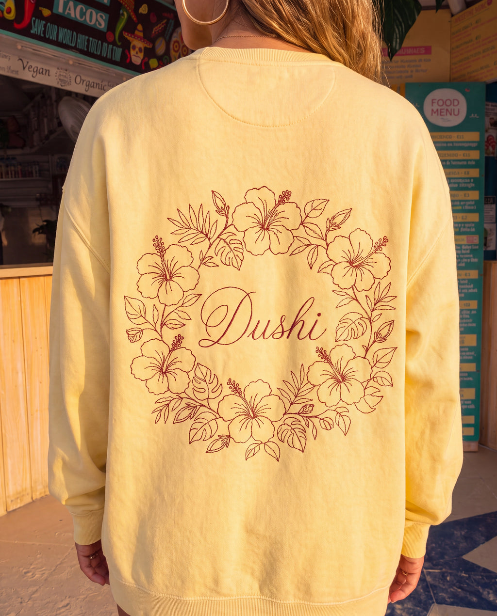 Aruba Dushi Wreath Redwork Sweatshirt close-up of the design, Butter