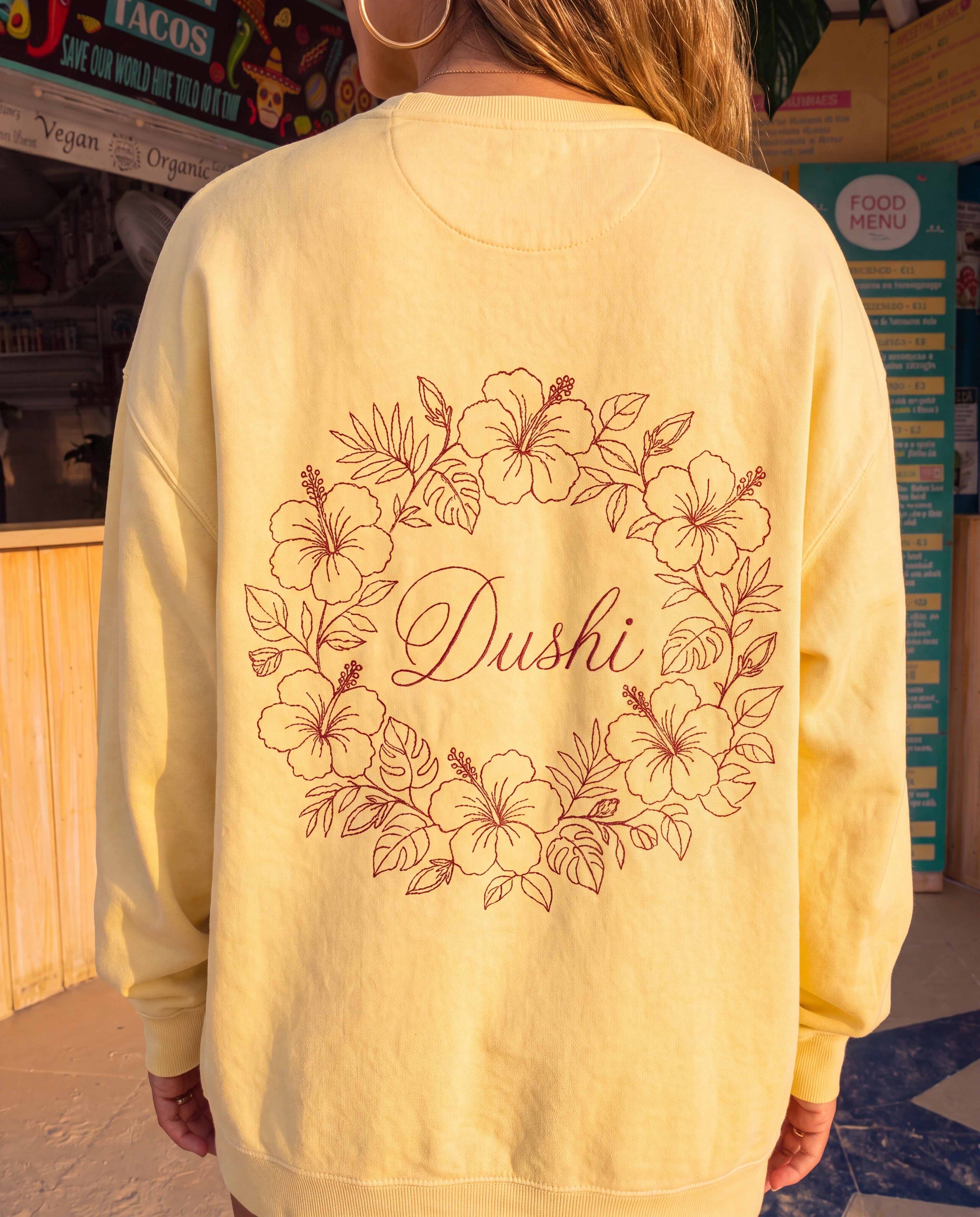 Aruba Dushi Wreath Redwork Sweatshirt close-up of the design, Butter
