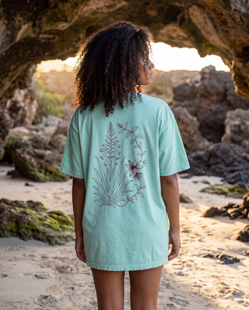 Aruba Aloe Vera Redwork Tee in Chalky Mint, worn on location in Aruba