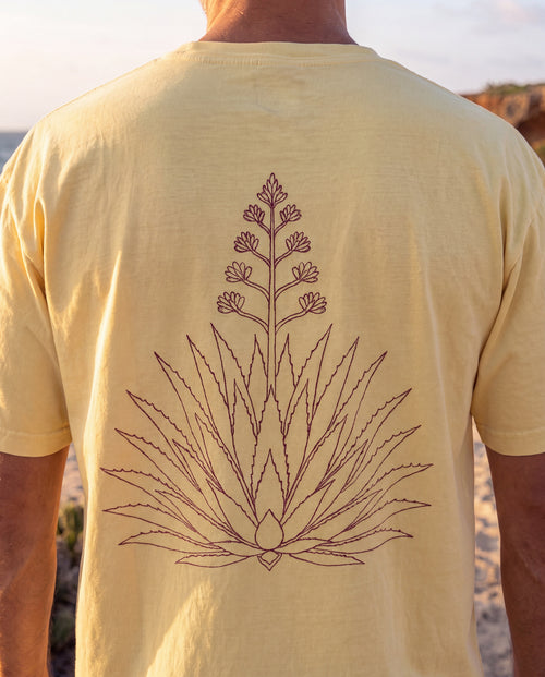 Aruba Agave Crest Redwork Tee close-up of the design, Butter