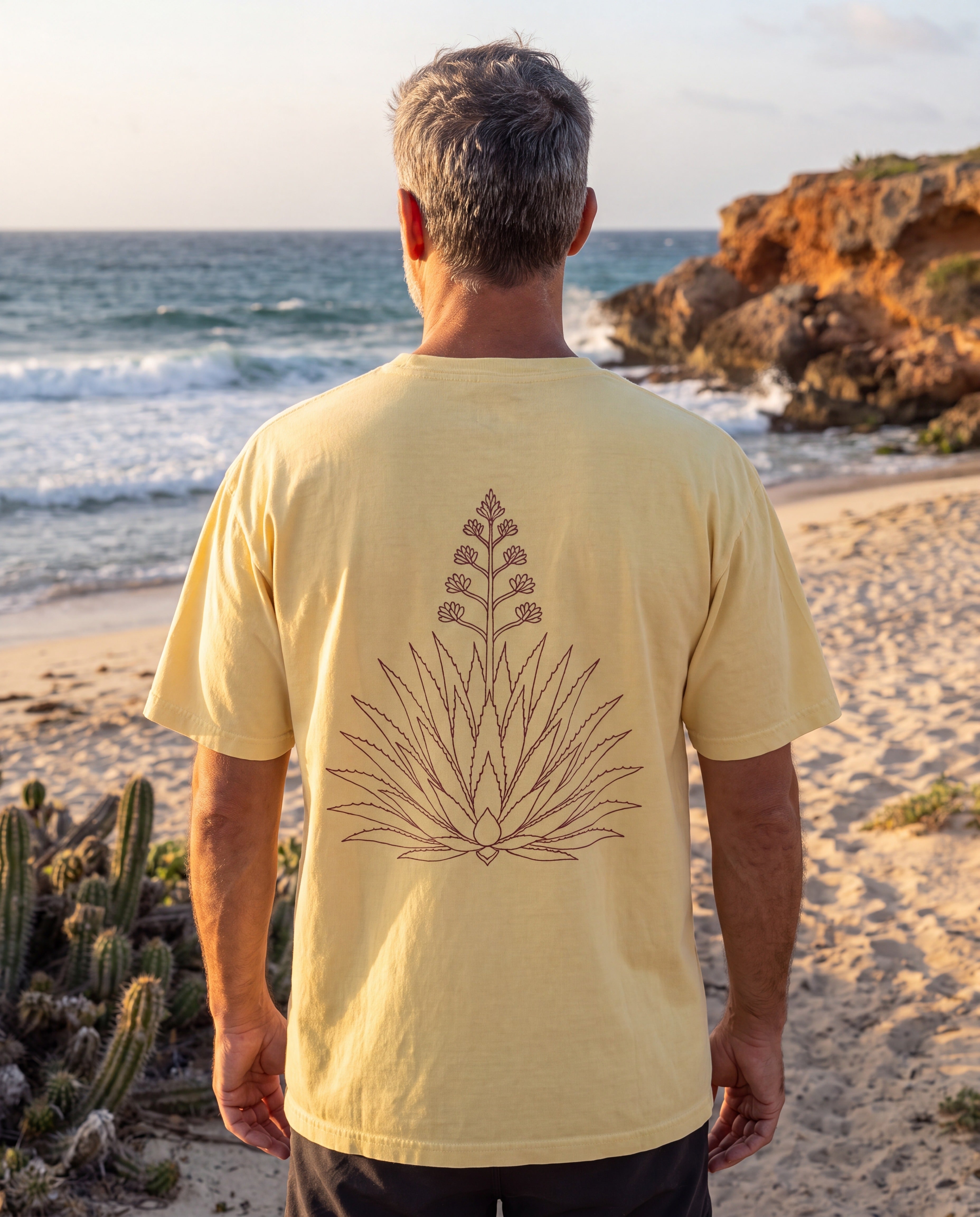 Aruba Agave Crest Redwork Tee in Butter, worn on location in Aruba
