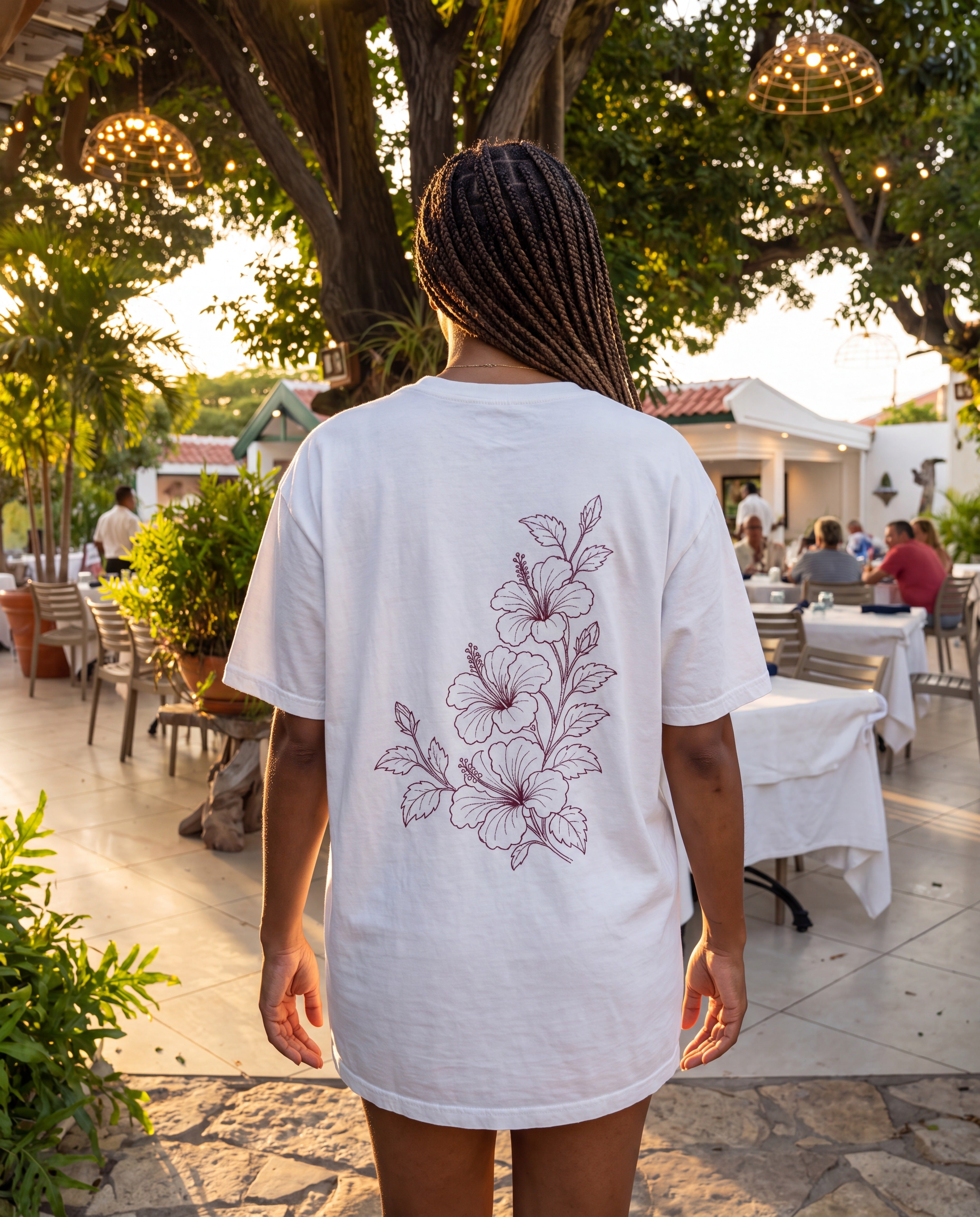 Aruba Hibiscus Spray Redwork Tee in White, worn on location in Aruba