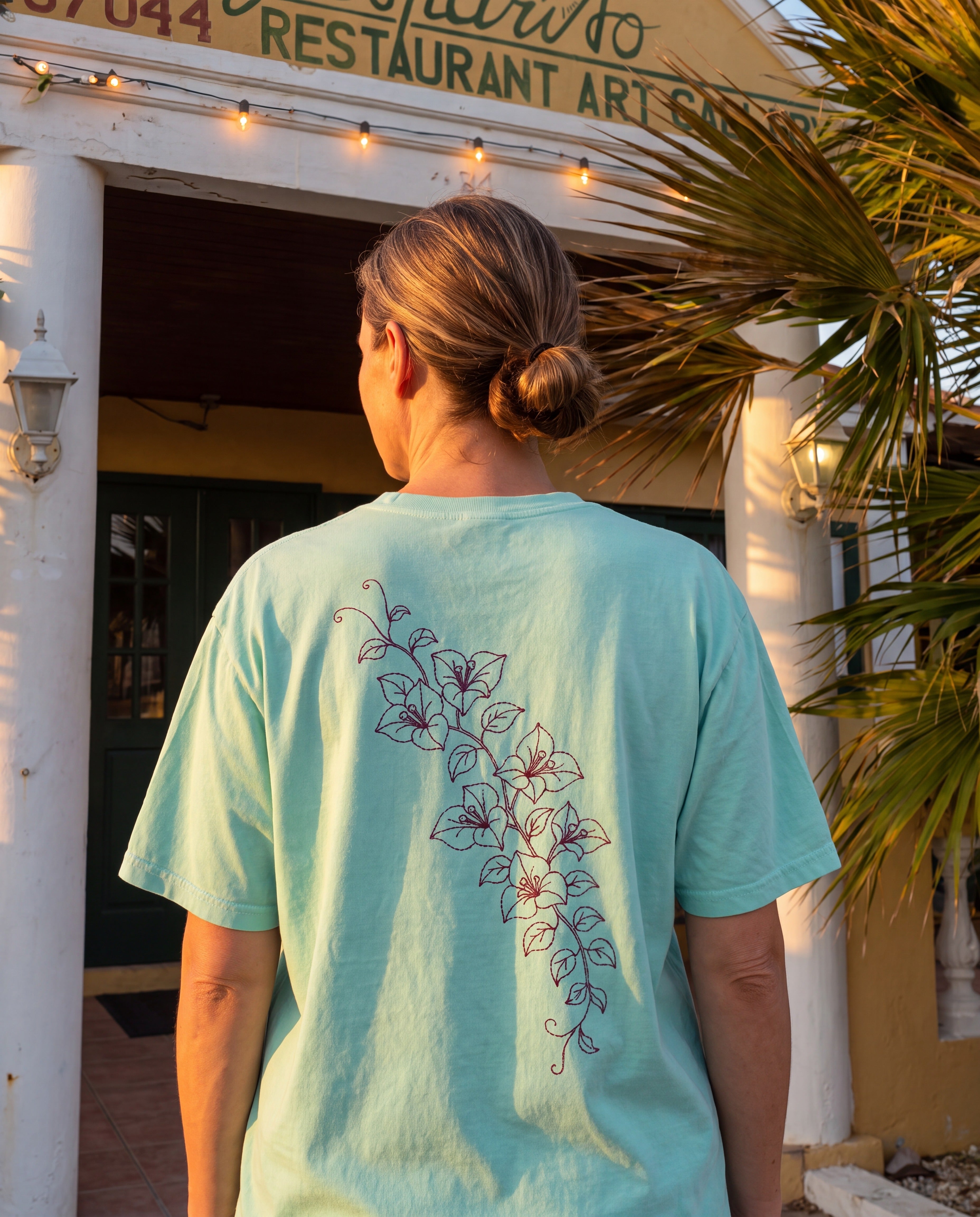 Aruba Bougainvillea Cascade Redwork Tee in Chalky Mint, worn on location in Aruba