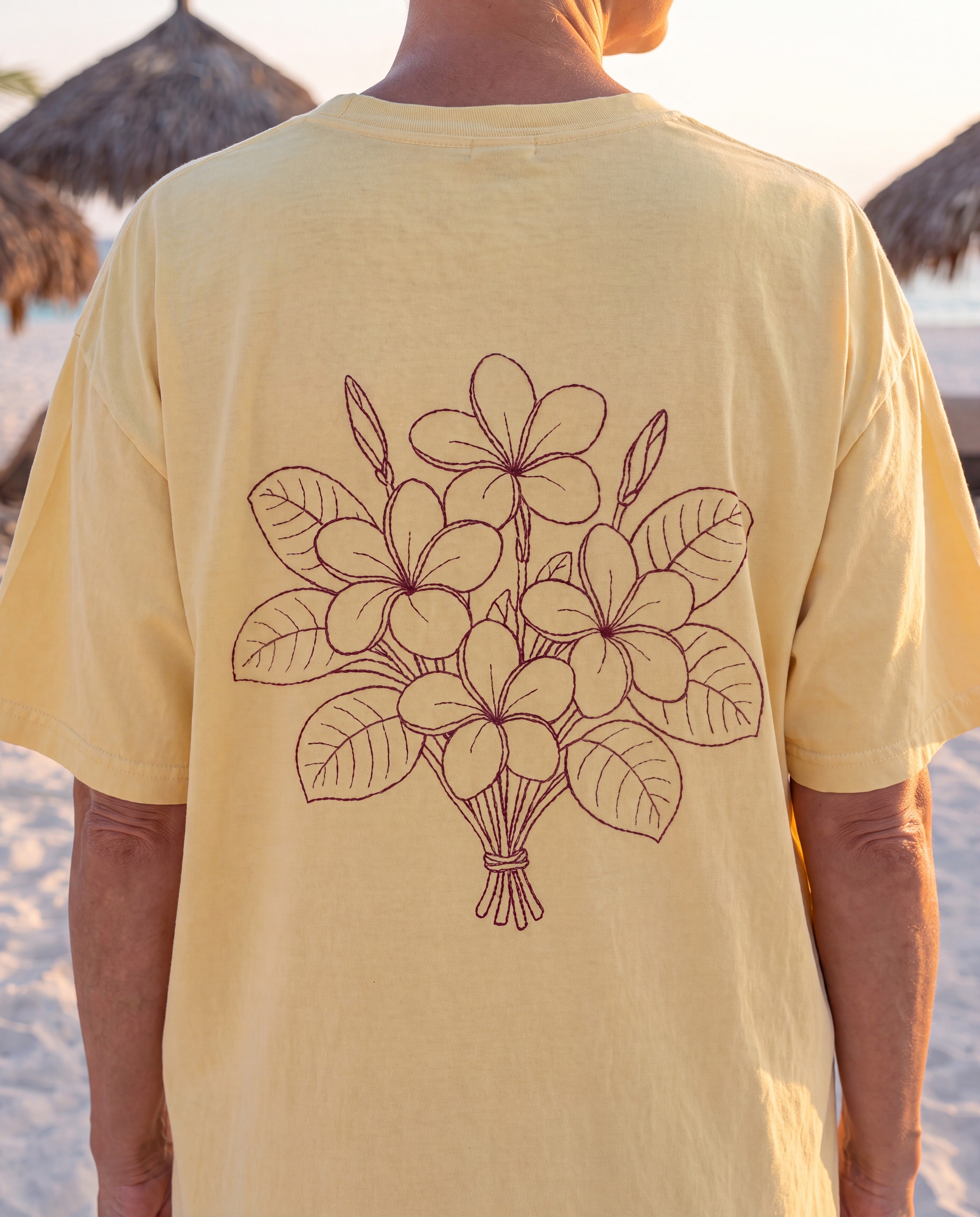 Aruba Frangipani Posy Redwork Tee close-up of the design, Butter
