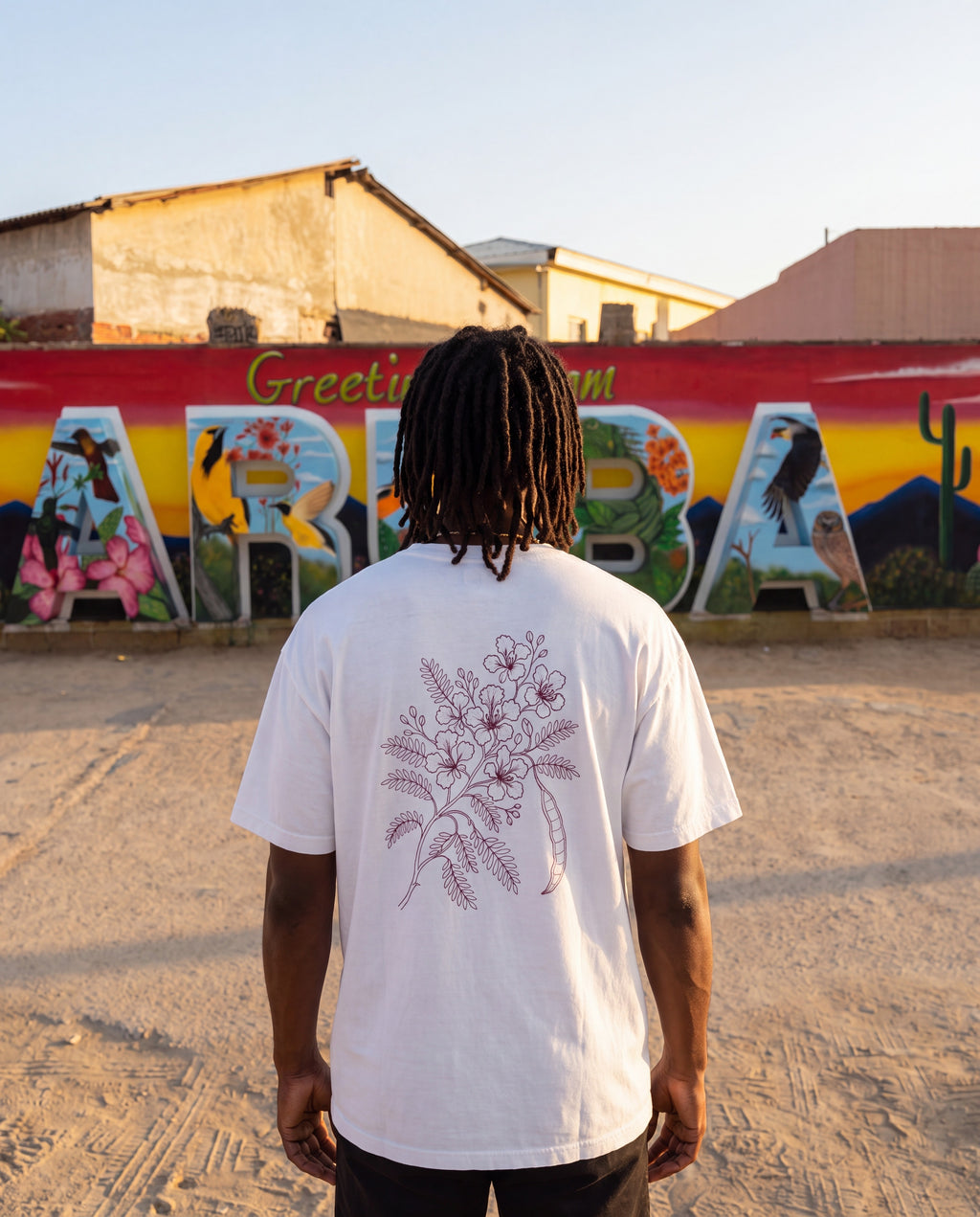 Aruba Flamboyant Flame Tree Redwork Tee in White, worn on location in Aruba