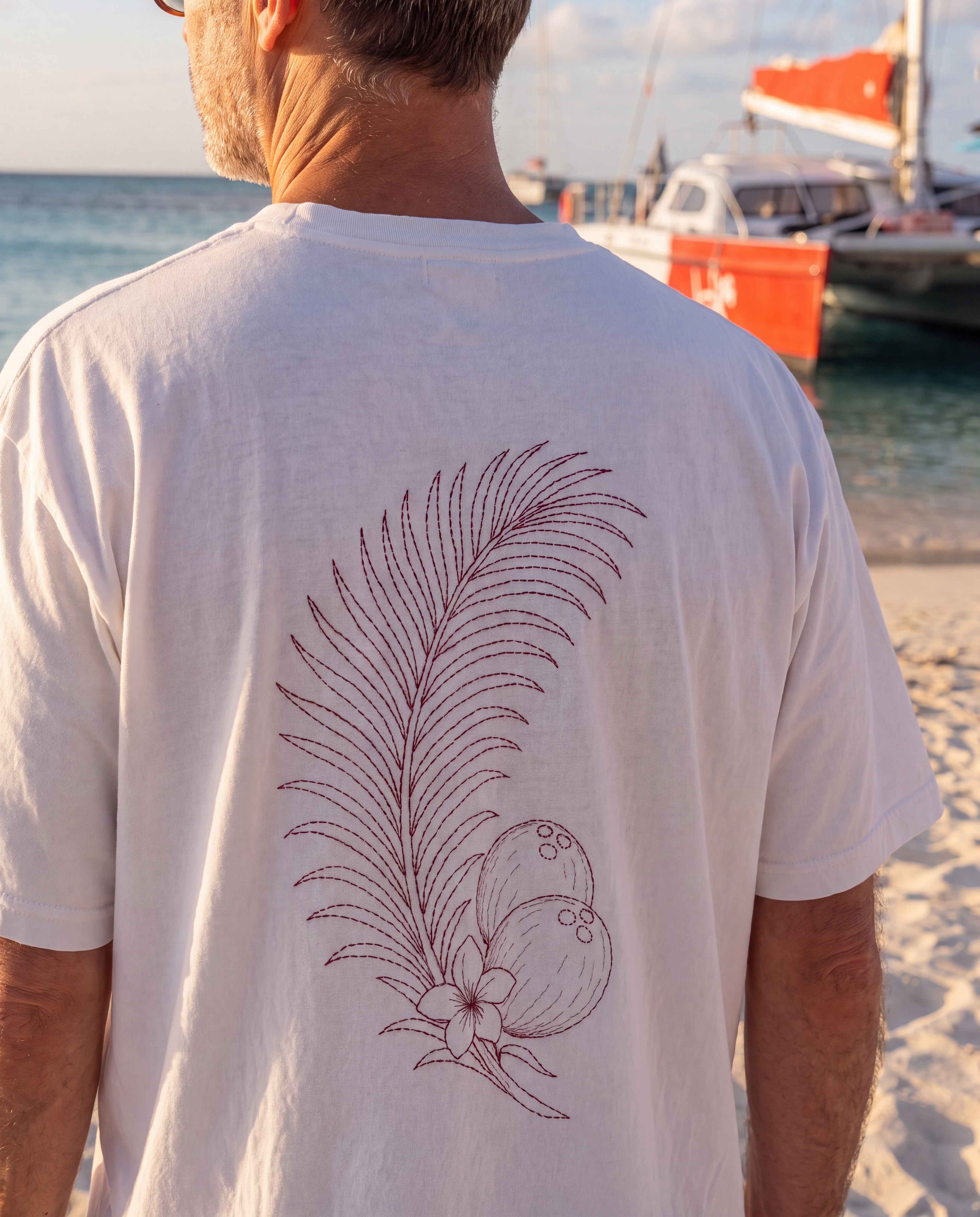 Aruba Coconut Palm Sprig Redwork Tee close-up of the design, White