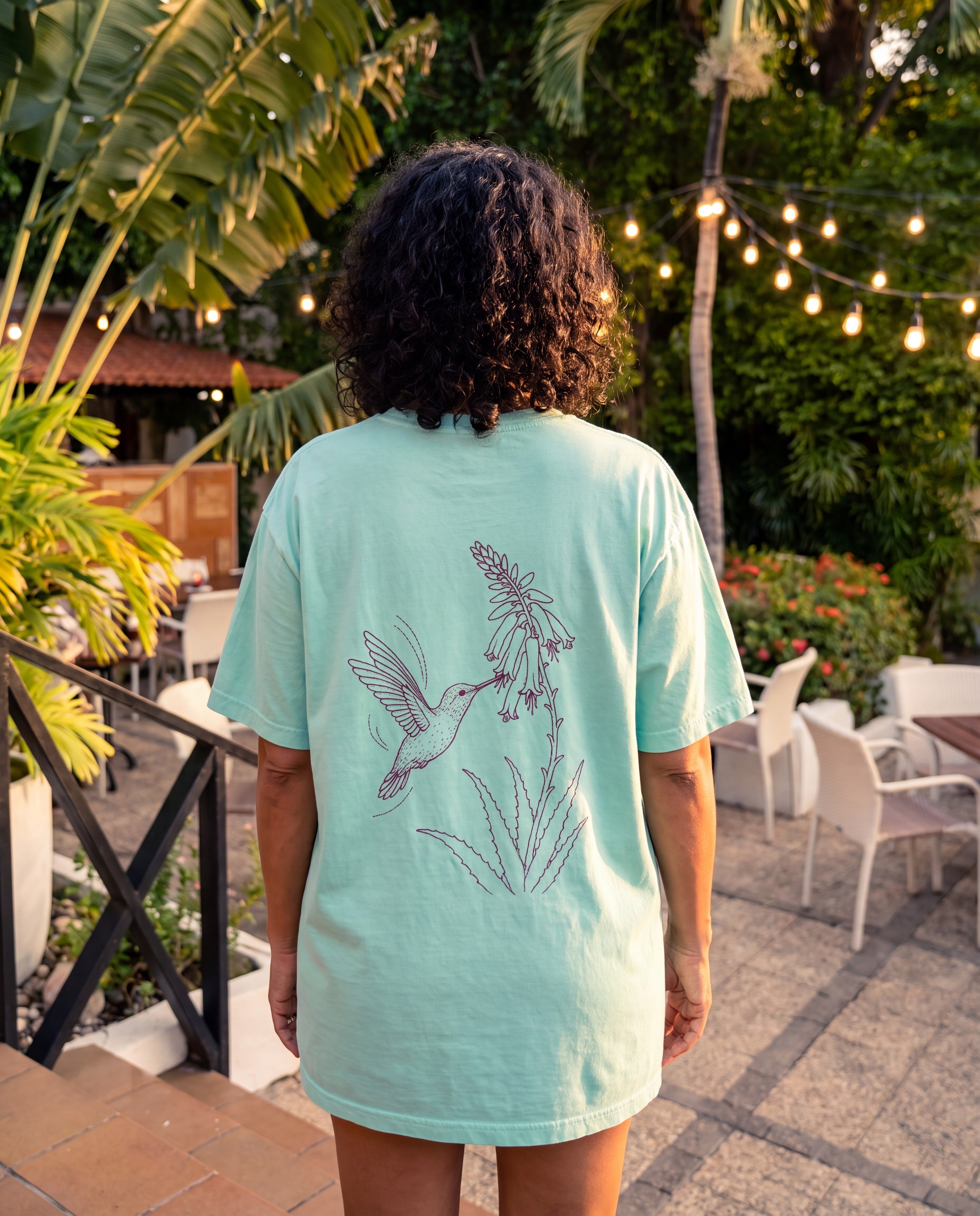 Aruba Hummingbird and Aloe Redwork Tee in Chalky Mint, worn on location in Aruba