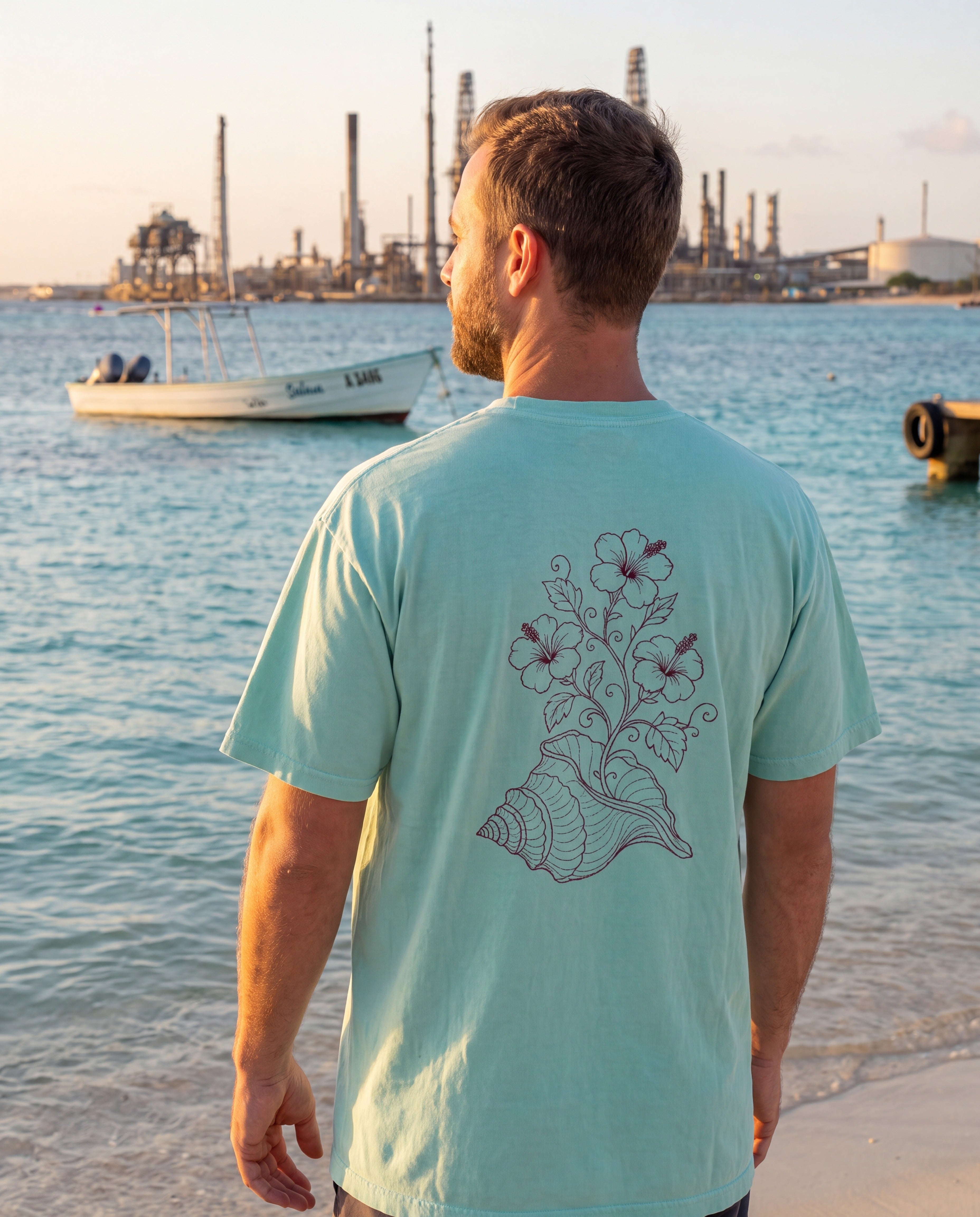 Aruba Conch Shell in Bloom Redwork Tee in Chalky Mint, worn on location in Aruba