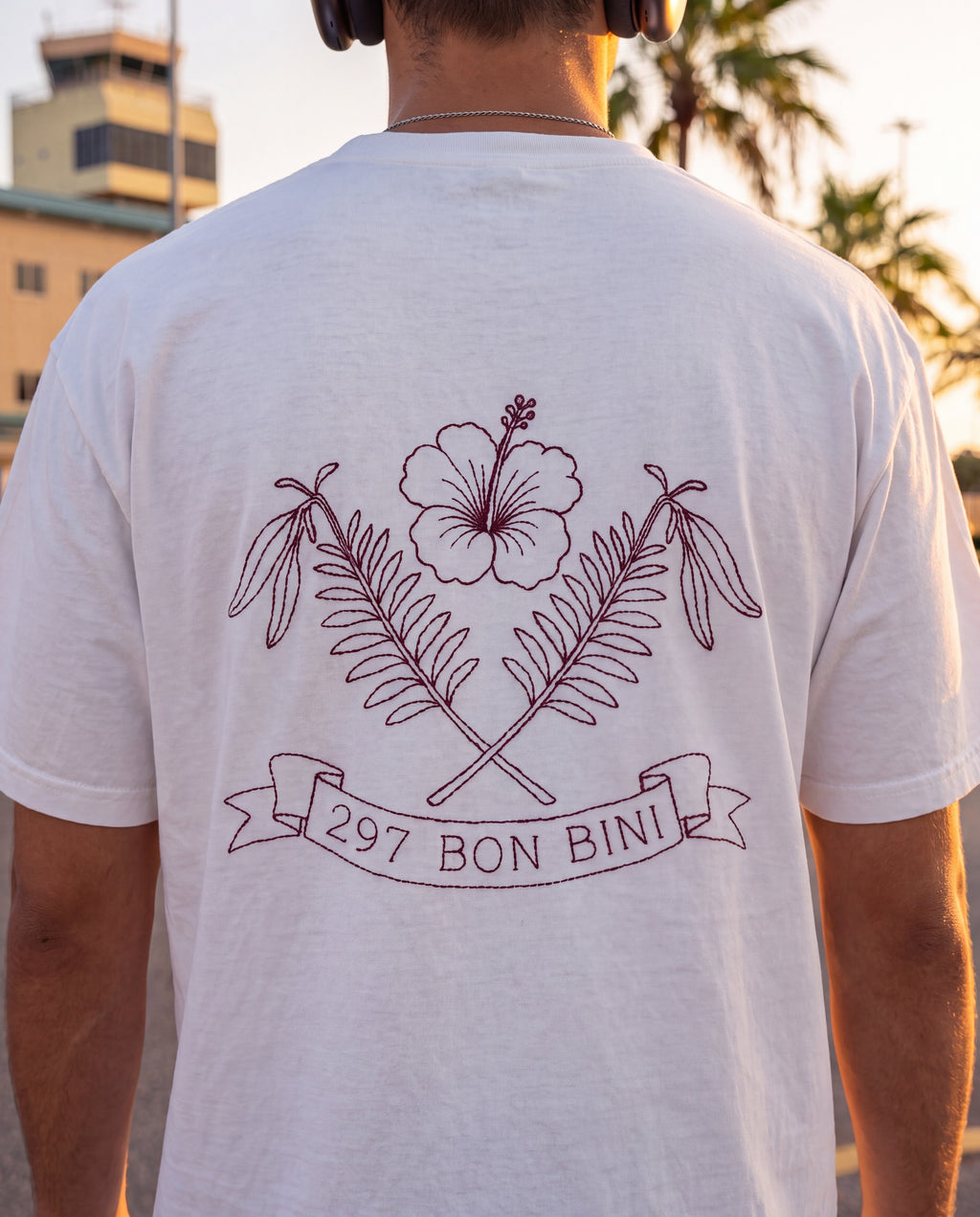 Aruba 297 Bon Bini Crest Redwork Tee close-up of the design, White