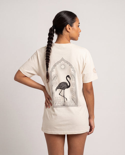 Model wearing the Aruba Arch Flamingo Tee
