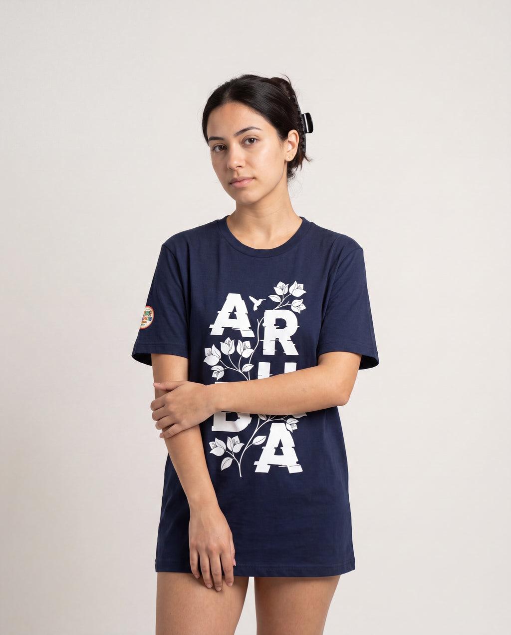 Model wearing the Aruba Bougainvillea Spine Tee