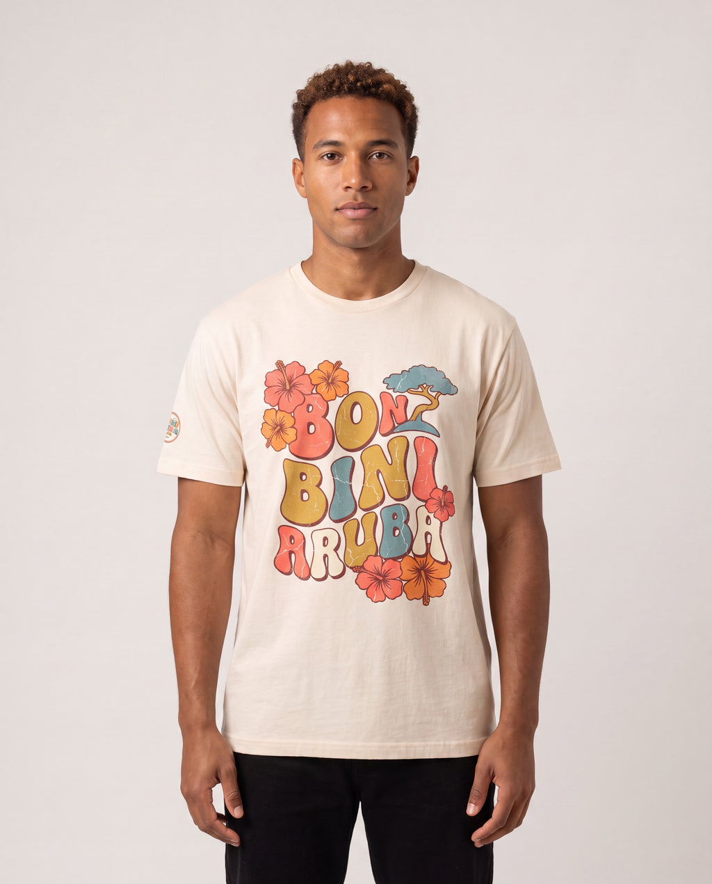 Model wearing the Bon Bini Aruba Retro Groovy Tee