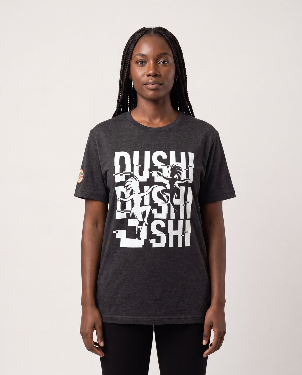 Model wearing the Dushi Aruba Glitch Carnival Tee
