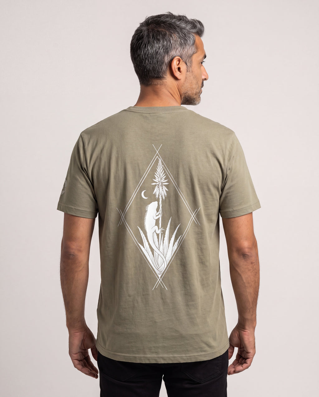 Model wearing the Aruba Iguana & Aloe Tee