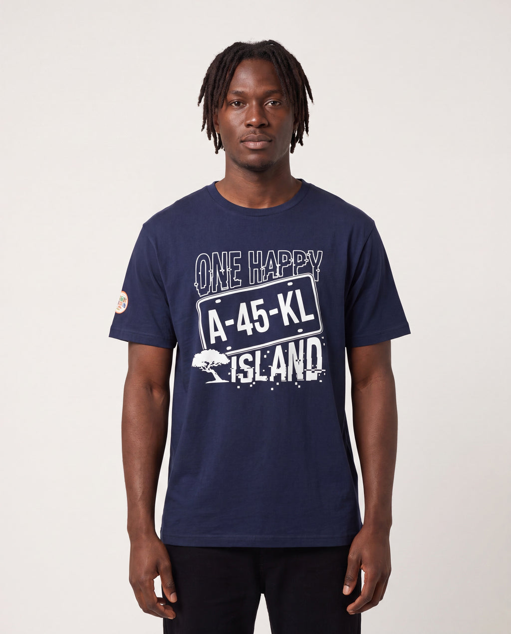 Model wearing the One Happy Island License Plate Tee