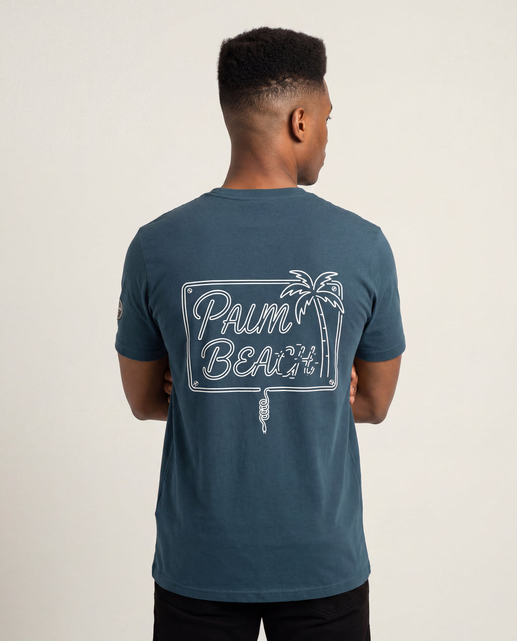 Model wearing the Palm Beach Aruba Neon Tee